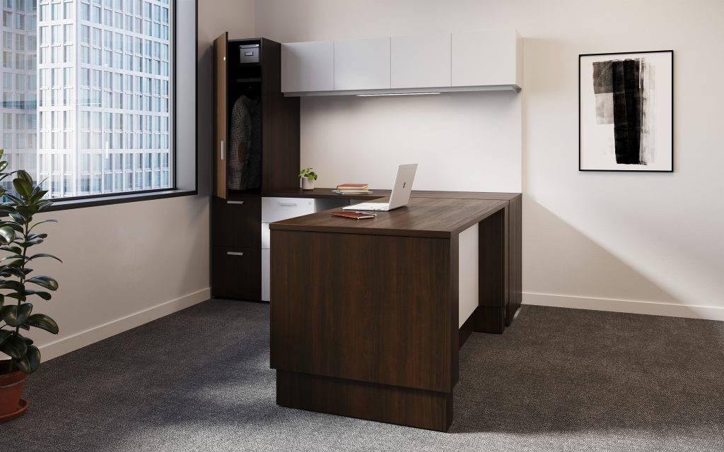Enclosed height adjustable with pedestal storage and open file storage. Wall-mounted hutch above a whiteboard and a wardrobe above file file storage beside.